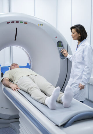 doctor-getting-patient-ready-ct-scan